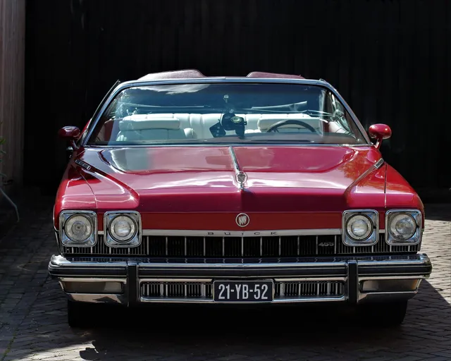 A red classic Buick convertible
