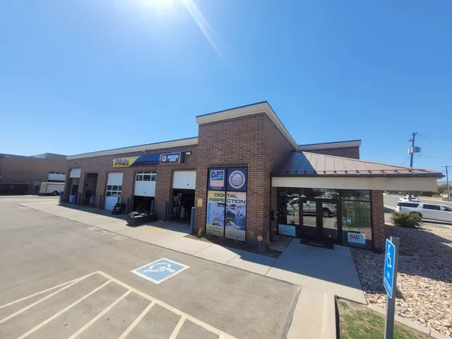 The customer entrance at McNeil's Auto Care in Riverton, alongside the service bays